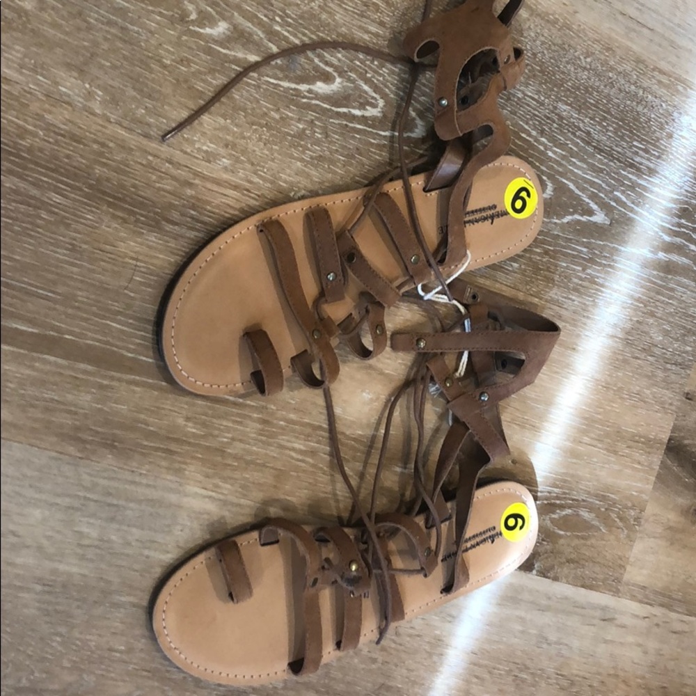 Sandals, lace up, tan, never been worn